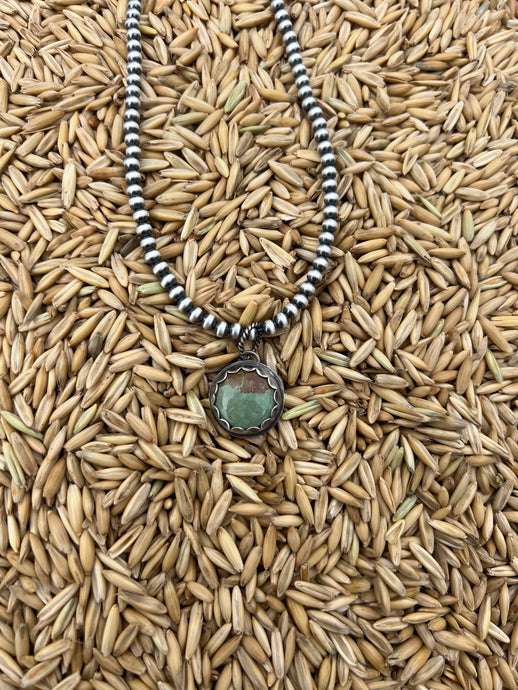 Small green circle pendant